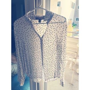 White blouse with black polka dots